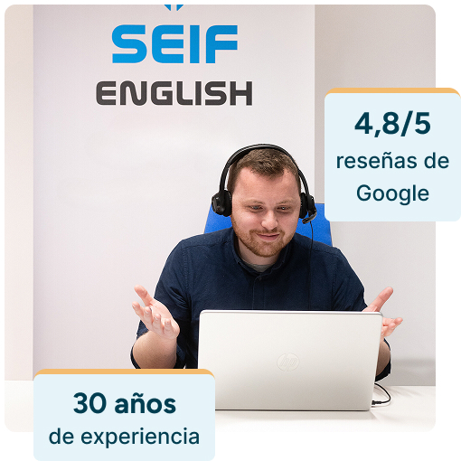 “Profesora nativa mirando su ordenador, impartiendo una clase de conversación de inglés online desde la academia en Madrid. Dos gráficos muestran que la academia tiene una valoración de 4.8 sobre 5 estrellas en Google Reviews y 30 años de experiencia enseñando inglés.” Profesora nativo mirando su ordenador, impartiendo una clase de conversación de inglés online desde la academia en Madrid. Dos gráficos muestran que la academia tiene una valoración de 4.8 estrellas sobre 5 en Google Reviews y 30 años de experiencia enseñando inglés.
